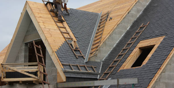 Roofer  Roof in slate tiles  Modern House stock photo
