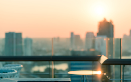 Rooftop Party Blur City View Background From Hotel Balcony Toward Blurry  Restaurant Dining Table During Sunset Happy Hour Romantic Golden Sunset  Stock Photo - Download Image Now - iStock