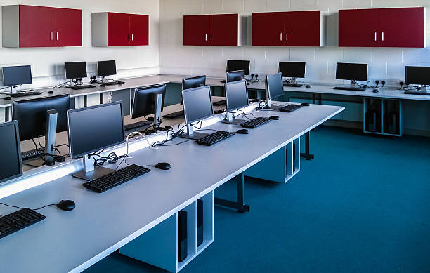 PC Room Room with computers in a row. computer training stock pictures, royalty-free photos & images