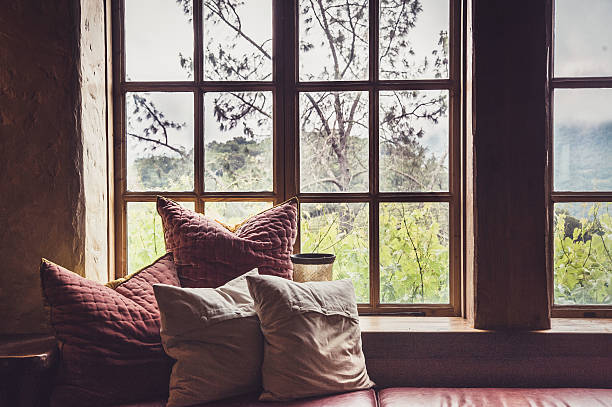 Room with a view Relax with a good book and a glass of wine alcove window seat stock pictures, royalty-free photos & images