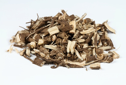 Roots prepared for making tinctures and medicines on the white background.