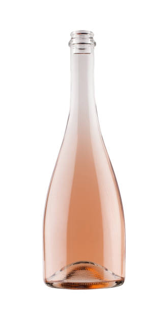 rose champagne bottle isolated on white front view close-up of rose pink champagne bottle with no label isolated on white background rose wine stock pictures, royalty-free photos & images