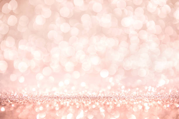 ゴールドとピンクのキラキラ、背景の defocused 抽象的な休日ライトを上昇しました。 - ピンク ストックフォトと画像