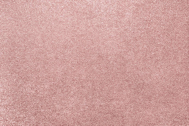 Rose Gold Glitter Foil Texture Pink Pale Millennial Wrapping Christmas Valentines Greeting Card Glittering Holiday Background Gift Paper Dusty Pink Beige Bokeh Confetti Light Reflection Pattern Macro Photography stock photo