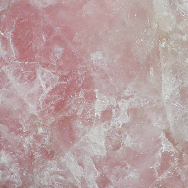 Rose quartz surface Close up of the surface of rose quartz rose quartz stock pictures, royalty-free photos & images