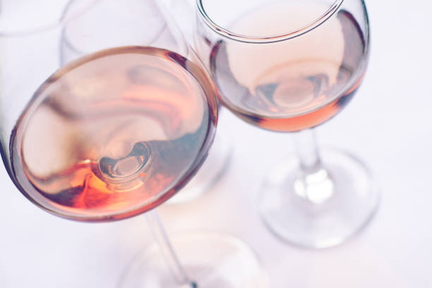 rose wine glasses stock photo