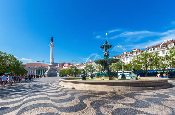 Rossio square old town in baixa district on sunny day at Lisbon,Portugal stock photo