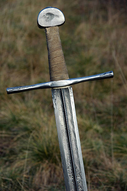 rough forged sword stock photo