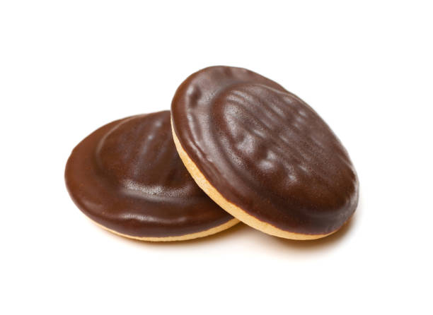 Round chocolate jaffa cake or biscuit cookie filled with natural jam stock photo