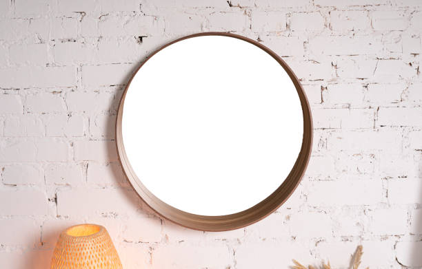 miroir rond avec la maquette blanche sur un mur blanc de brique. - round mirror photos et images de collection