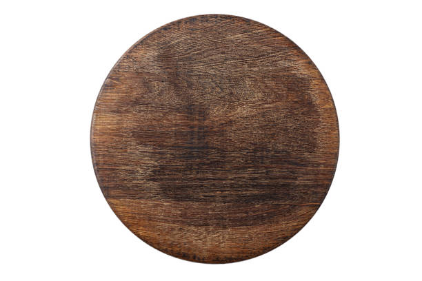 round wooden pizza board stock photo