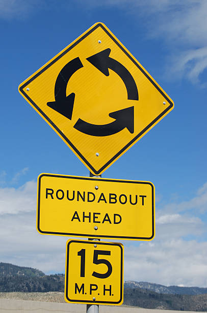 Roundabout Ahead Sign stock photo