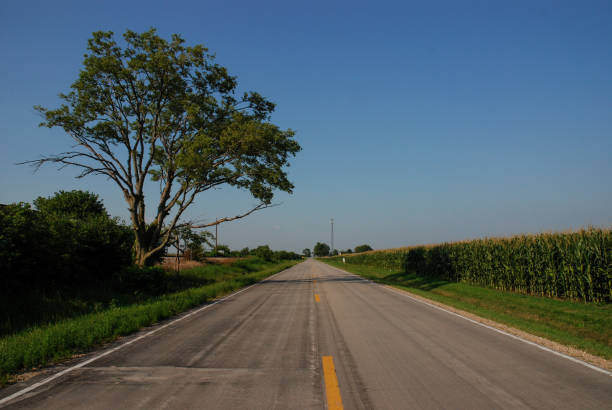 Route 66 along with corn field between Chicago and St Louis, Illinois. August 1, 2007. stock photo
