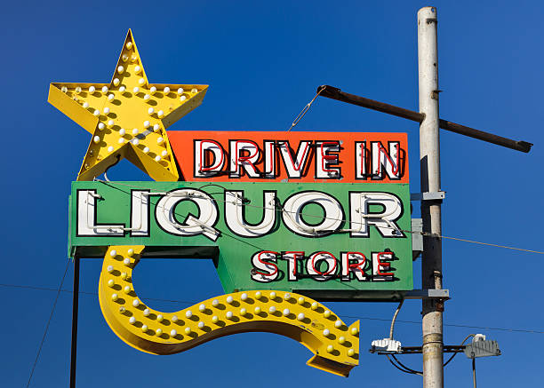 Route 66 Americana Drive in Liquor Store Neon Sign stock photo