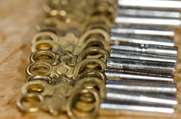 Row Of Antique Pocket Watch Keys Laying On The Watchmakers Bench