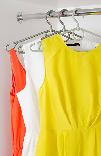 row of bright colorful dress stock photo