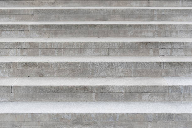Row of the gray concrete stairs Row of the gray concrete stairs bannister stock pictures, royalty-free photos & images