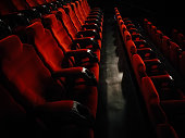 istock Rows of empty red seats at the movie theater 1368180022