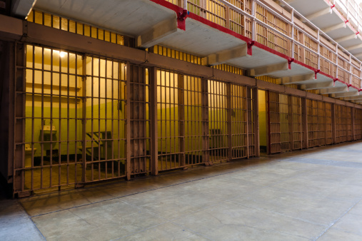 Rows of locked prison cells, Alcatraz, San Francisco, California. Bonus: ghost (see right-middle).