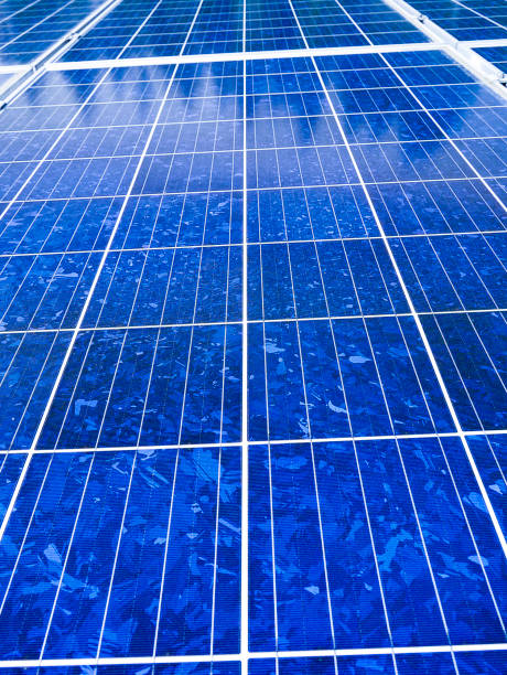 Rows of solor panels Blue solar panels at a solar powerplant. circular economy stock pictures, royalty-free photos & images