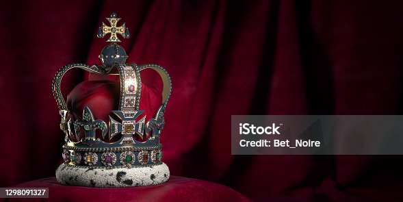 istock Royal golden crown with jewels on pillow on pink red background. Symbols of UK United Kingdom monarchy. 1298091327