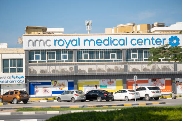 NMC Royal Pharmacy and Medical Clinic in Ras al Khaimah, United Arab Emirates for patient care and doctor check ups on bright sunny day. " stock photo