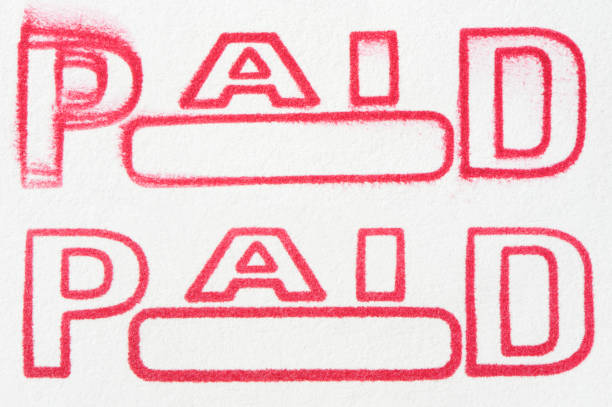 Rubber Stamp Paid Rubber Stamp Paid  paid stamp stock pictures, royalty-free photos & images