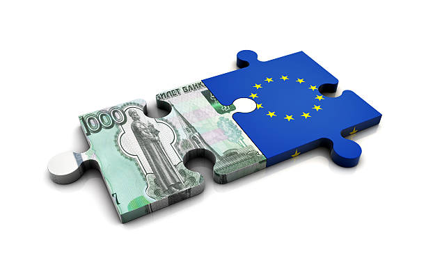 ruble and european union flag on puzzle - schuld hulp verlening stockfoto's en -beelden