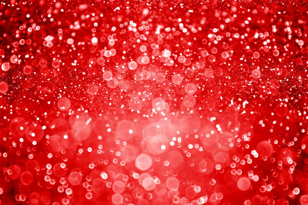 Ruby red Christmas, Valentine Day or New Year’s glitter background stock photo
