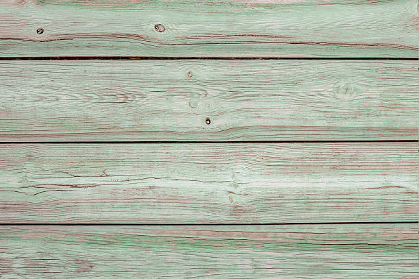 rugged green painted wooden background stock photo
