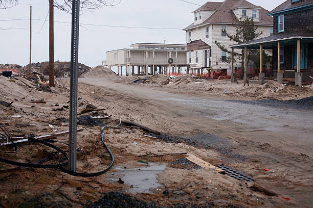 Ruined beachfront property at the Jersey Shore A street in Bay Head, NJ after Hurricane Sandy new jersey street flooding stock pictures, royalty-free photos & images