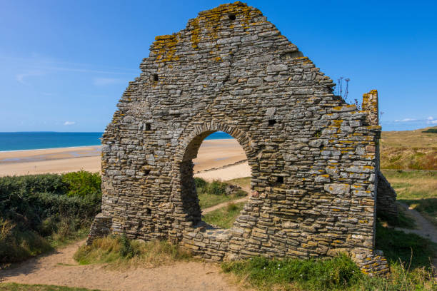 Ruins of an ancient church in the cliffs on the Cape Carteret. Barneville-Carteret, Normandy, France Normandy, France - August 25, 2018: Ruins of an ancient church in the cliffs on the Cape Carteret. Barneville-Carteret, Normandy, France barneville carteret photos stock pictures, royalty-free photos & images