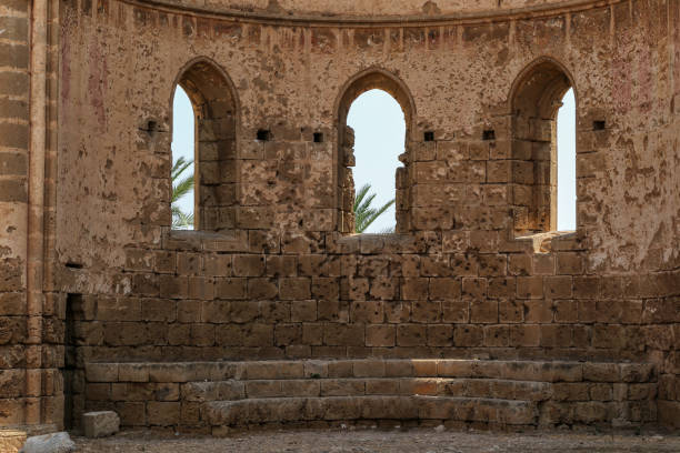 Ruins of St George Church, Famagusta, Cyprus Medieval ruins of Church of St George of the Greeks, Famagusta, Northern Cyprus. Detail of the wall with three windows in old fortress. Copy space famagusta stock pictures, royalty-free photos & images