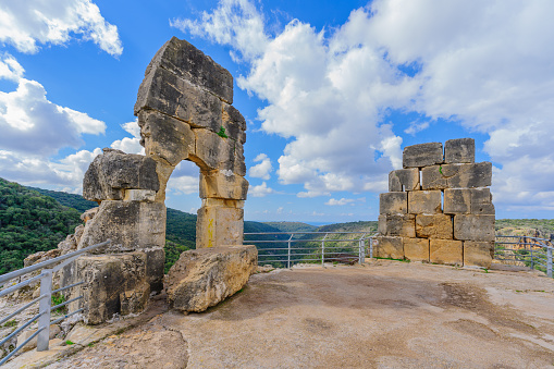 View of the ruins of the Crusader Montfort Castle, with the Kziv stream valley, and the Mediterranean Sea in the background. Upper Galilee, Northern Israel