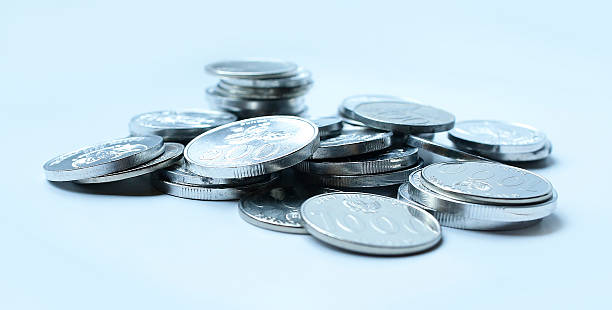 Rupiah coins on white background stock photo