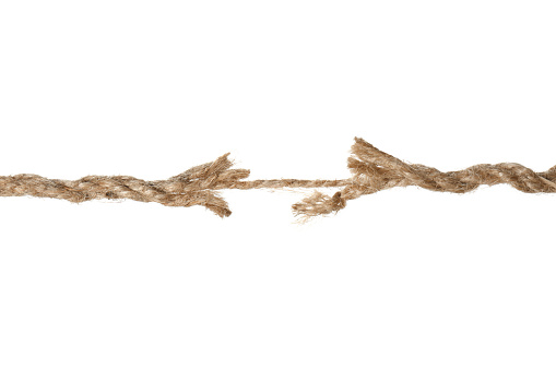 Rupture of hemp rope on white background