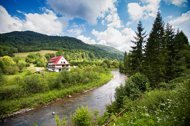Rural view with river in Bieszczady mountains, Poland Rural view with river in Bieszczady mountains, Poland bieszczady mountains stock pictures, royalty-free photos & images
