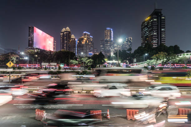 Rush hour captured with blurred motion in the heart of the business district of Jakarta in Indonesia stock photo