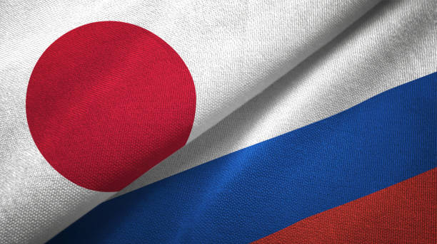 ロシアと日本 2 つのフラグ一緒に realations 繊維布の生地テクスチャ - ロシア ストックフォトと画像
