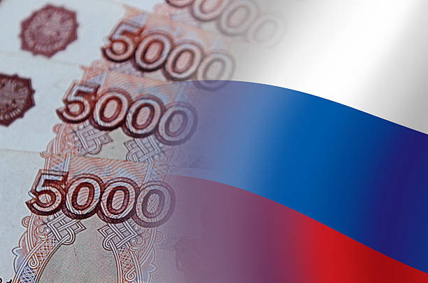 Russian flag and money stock photo
