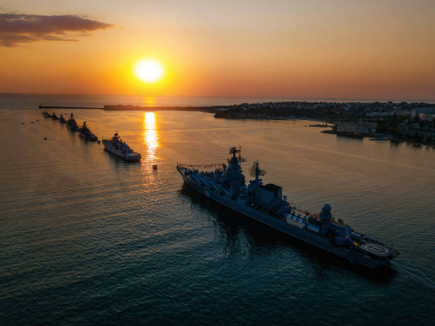 Russian military ship in Sevastopol bay at Navy day, aerial view stock photo