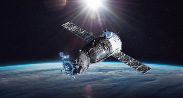 Russian spaceship on orbit of Earth. Sunlight and sky with clouds on background. Spacecraft in outer space. Sci-fi wallpaper. Elements of this image furnished by NASA Russian spaceship on orbit of Earth. Sunlight and sky with clouds on background. Spacecraft in outer space. Sci-fi wallpaper. Elements of this image furnished by NASA (url:https://www.nasa.gov/sites/default/files/styles/full_width_feature/public/thumbnails/image/iss044e000028.jpg https://www.nasa.gov/sites/default/files/styles/full_width_feature/public/thumbnails/image/iss044e000028.jpg ) soyuz space mission stock pictures, royalty-free photos & images