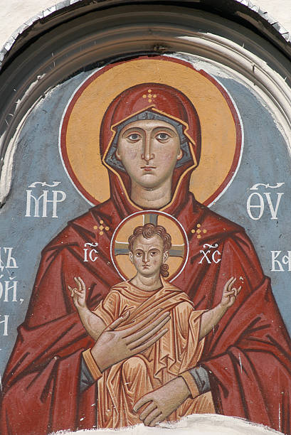 Russian Virgin and Child The Virgin and Child, an ancient fresco above the gate of an orthodox church in Pskov, Russia. pskov russia stock pictures, royalty-free photos & images