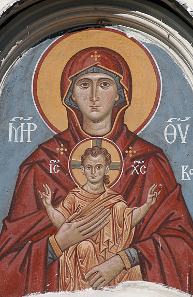 Russian Virgin and Child The Virgin and Child, an ancient fresco above the gate of an orthodox church in Pskov, Russia. pskov russia stock pictures, royalty-free photos & images