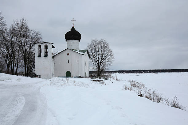 Russian winter. Vybuty Pogost near Pskov, Russia. Russian winter. Church of Saint Elijah the Prophet at the Vybuty Pogost near Pskov, Russia. pskov russia stock pictures, royalty-free photos & images