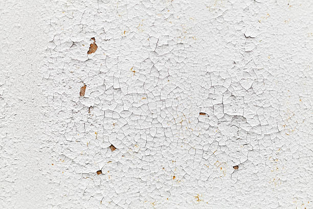 Rusted white metal wall with cracks, background texture Rusted white metal wall with cracks on paint, background texture peeled stock pictures, royalty-free photos & images