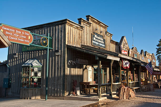 Storefronts in Bryce Canyon City Bryce Canyon City, Utah, USA - May 11, 2011: Rustic storefronts in Bryce Canyon City depict old west history. jeff goulden bryce canyon national park stock pictures, royalty-free photos & images