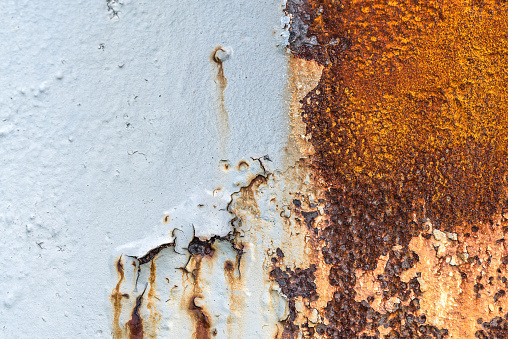 Rusty metallic surface under sunshine.