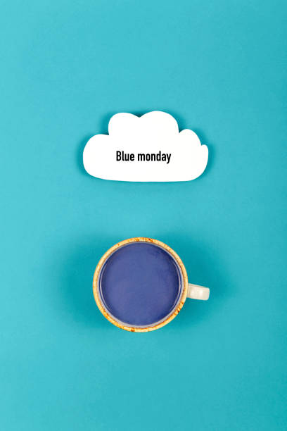 грустный синий понедельник надписи с облаком и пить - blue monday стоковые фото и изображения