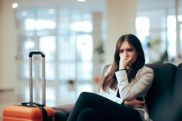 Sad Upset Woman Crying in the Airport stock photo